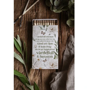 Tulitikkuaski tekstillä  kuva