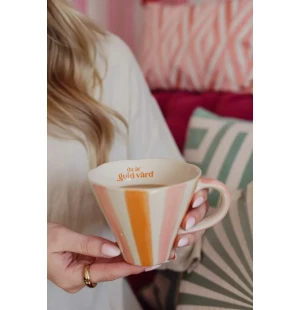 Muki tekstillä kuva