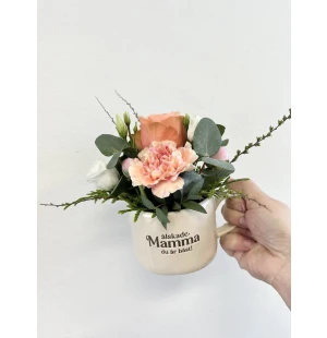 Muki kukka-asetelmalla kuva